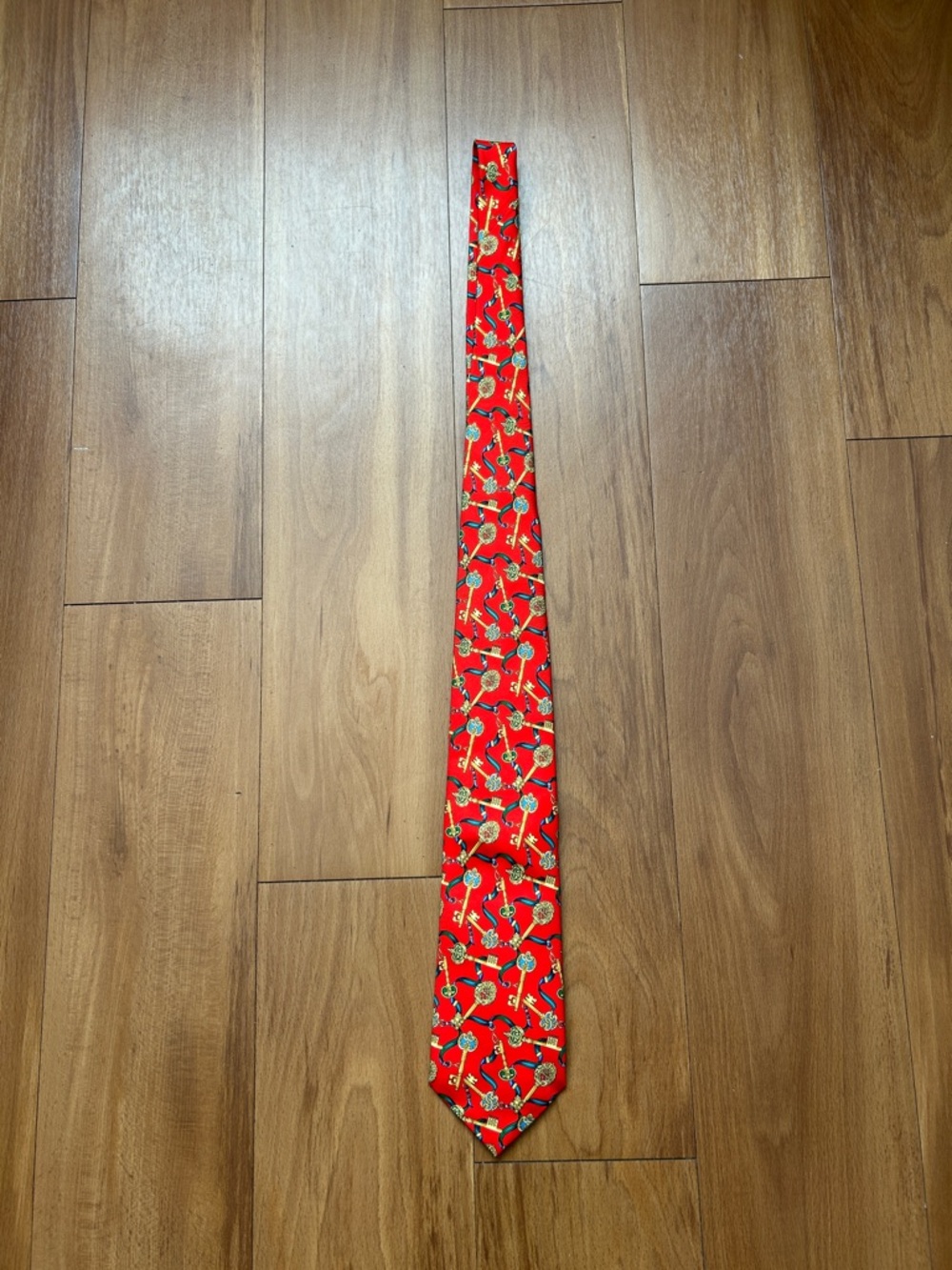 Burberry Red Silk Tie with Gold and Black Key Motif